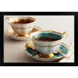 "Elegant tea cups and saucers, close-up" Black Framed Print
