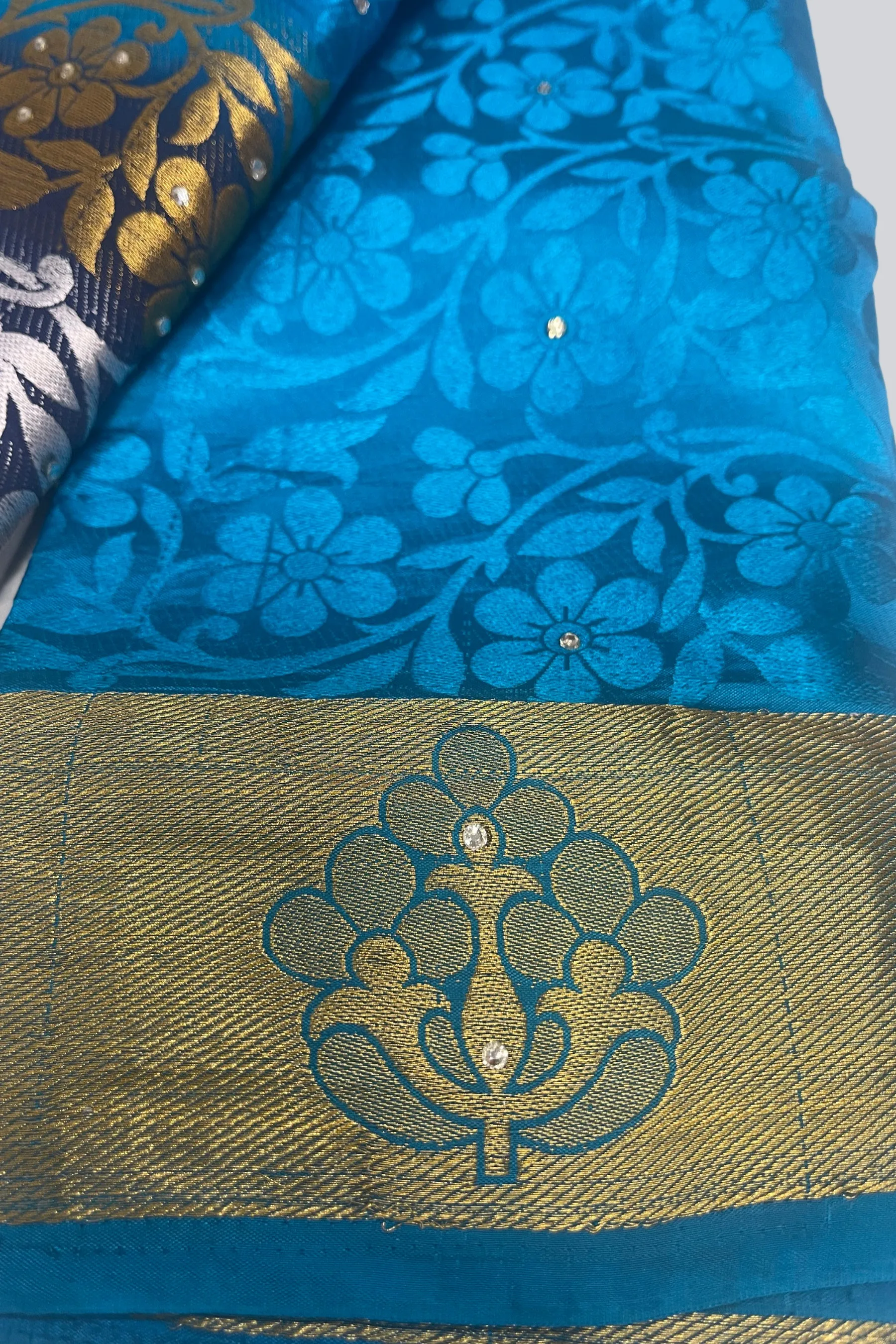 Radiant Charm: Embossed Silk Cotton Saree with Stunning Stone Work